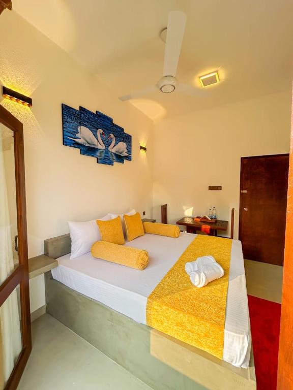 Postel nebo postele na pokoji v ubytování The Kandy Havens