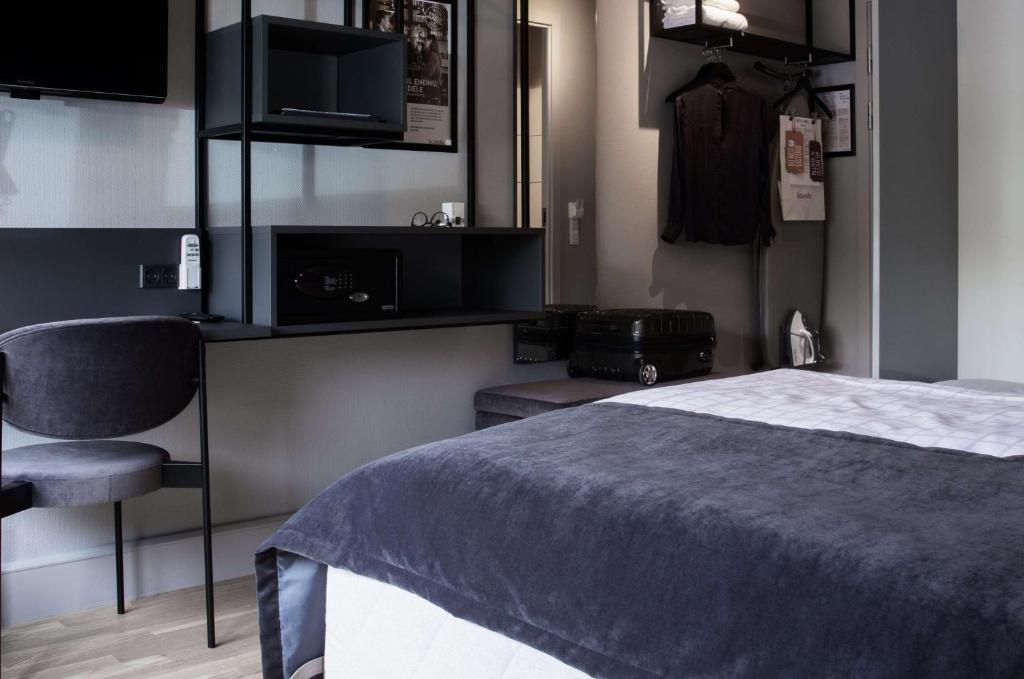 Postel nebo postele na pokoji v ubytování Scandic Odense