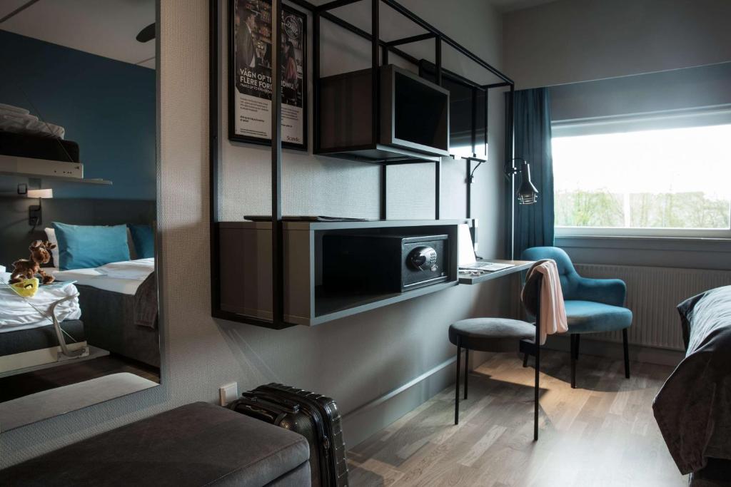 Postel nebo postele na pokoji v ubytování Scandic Odense