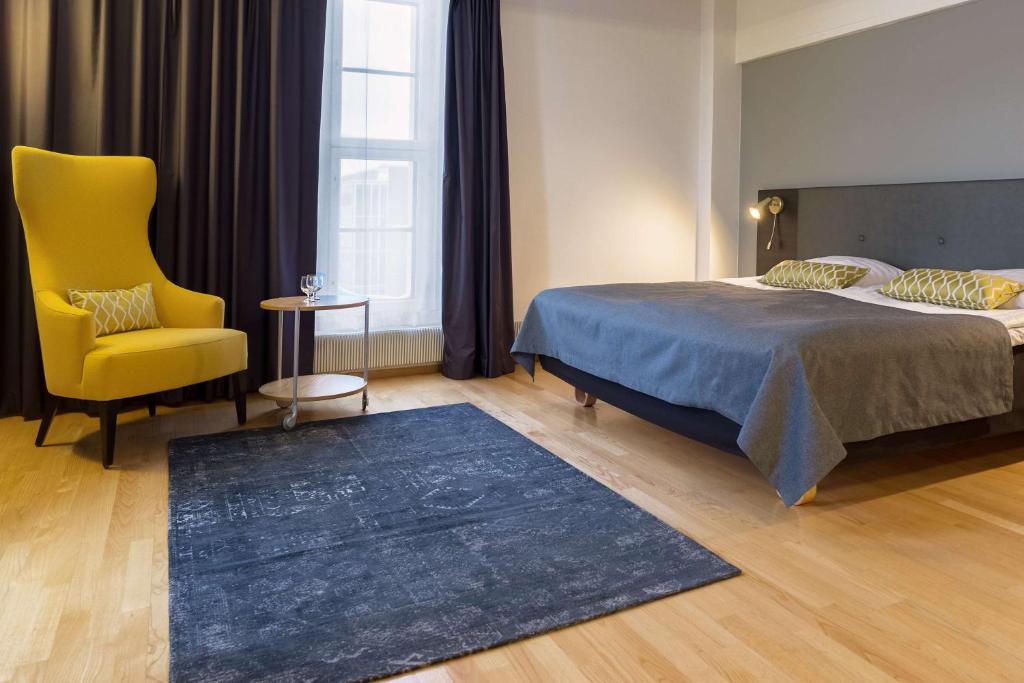 Postel nebo postele na pokoji v ubytování Scandic Grand Marina