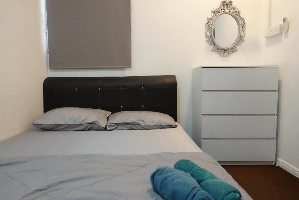 Voodi või voodid majutusasutuse ManMai Homestay Double Storey toas