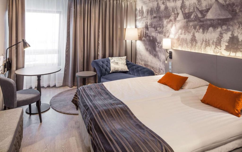Vuode tai vuoteita majoituspaikassa Scandic Rovaniemi City