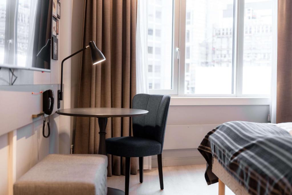 Postel nebo postele na pokoji v ubytování Scandic Byporten
