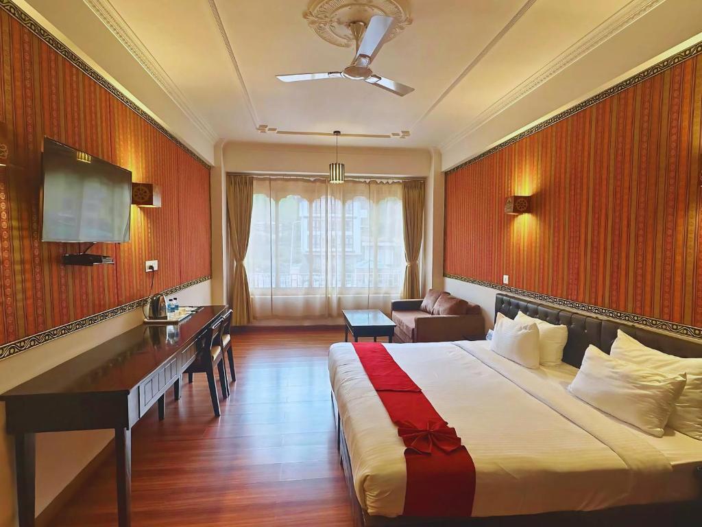 Postel nebo postele na pokoji v ubytování Hotel Migmar