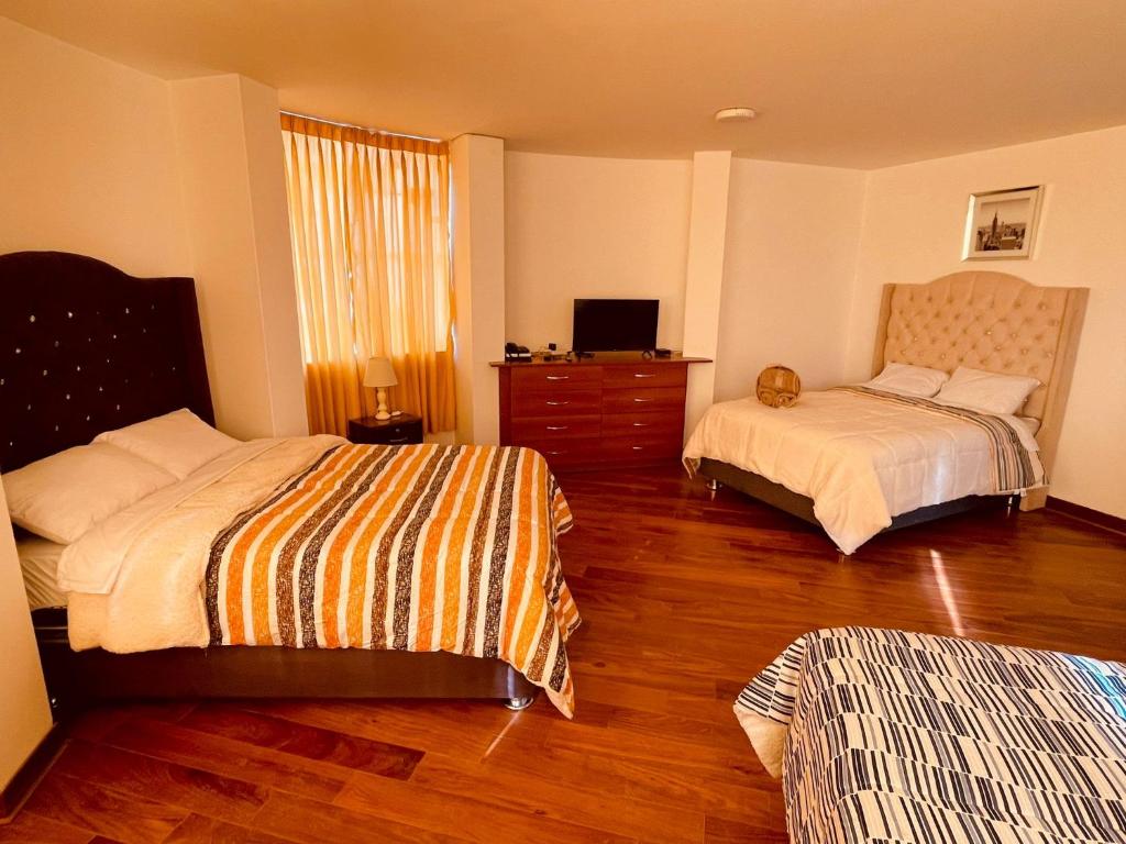 Postel nebo postele na pokoji v ubytování Kay-House