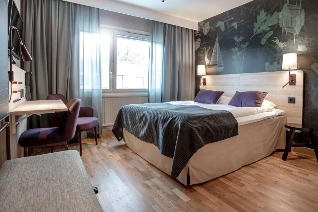 Postel nebo postele na pokoji v ubytování Scandic Linköping Väst