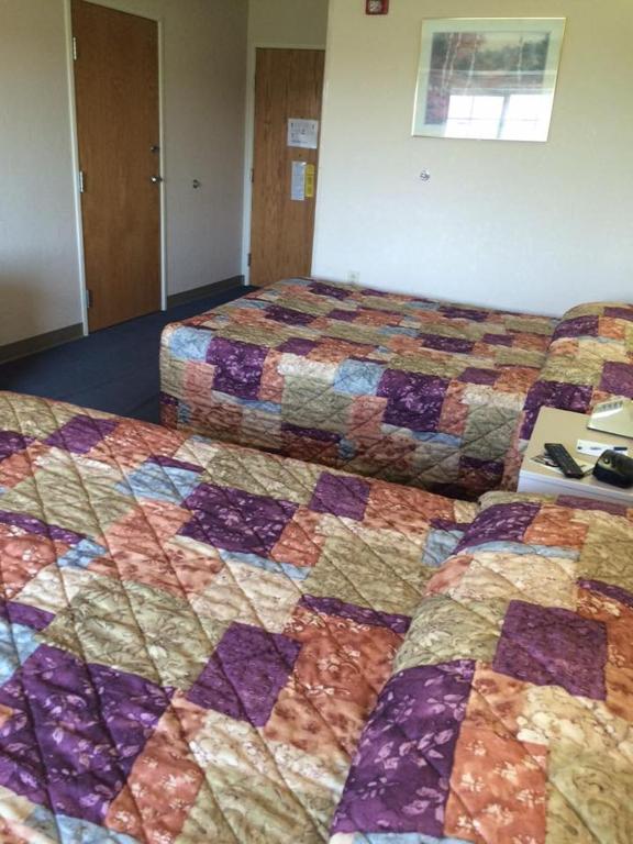 Postel nebo postele na pokoji v ubytování Microtel Inn by Wyndham Champaign