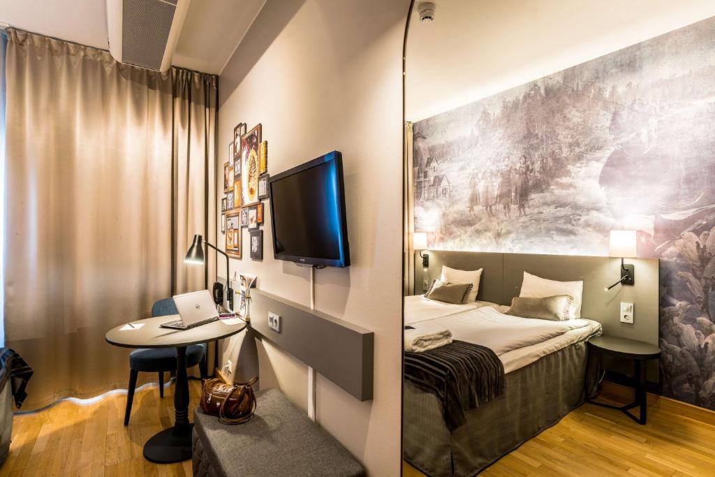 Postel nebo postele na pokoji v ubytování Scandic Skellefteå