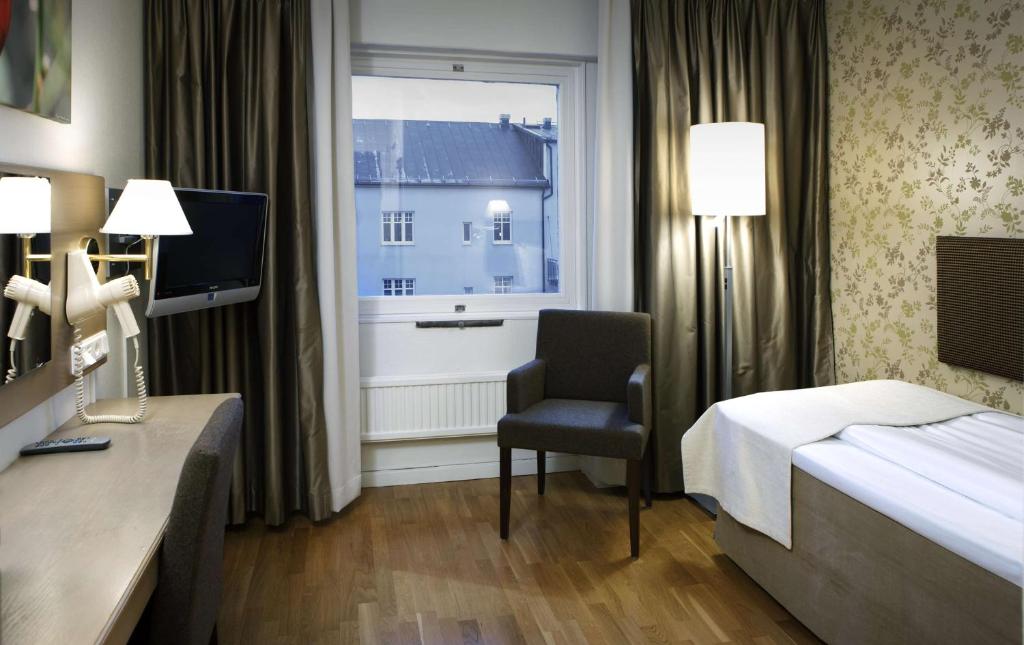 Postel nebo postele na pokoji v ubytování Scandic Billingen