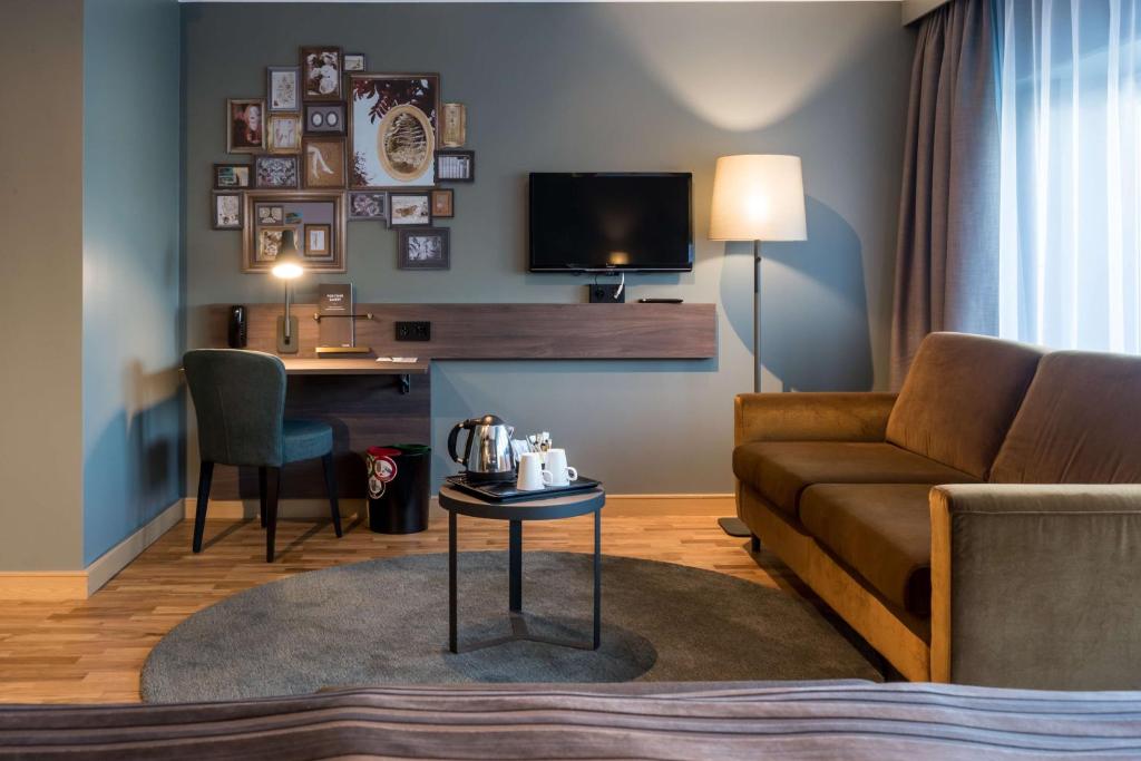 TV a/nebo společenská místnost v ubytování Scandic Infra City
