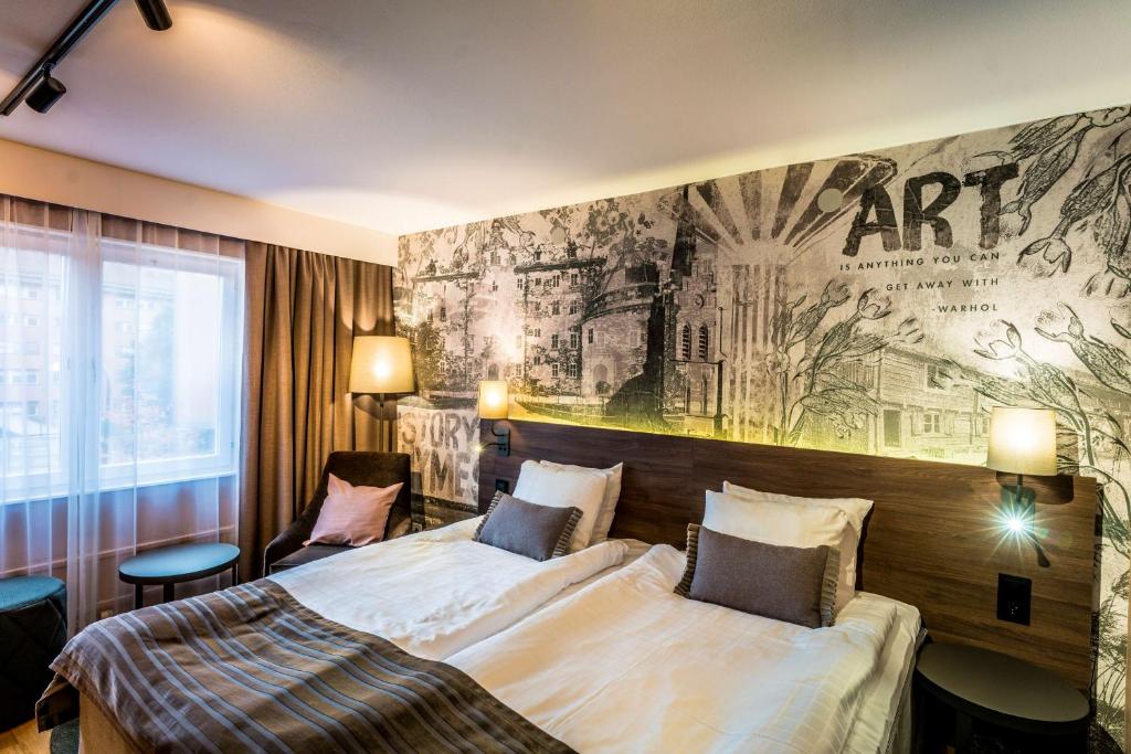 Postel nebo postele na pokoji v ubytování Scandic Grand Hotel