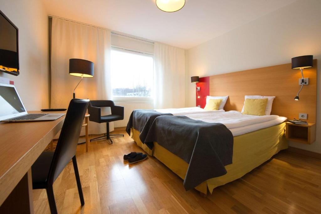 Postel nebo postele na pokoji v ubytování Scandic Örnsköldsvik
