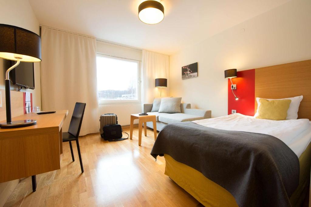Postel nebo postele na pokoji v ubytování Scandic Örnsköldsvik