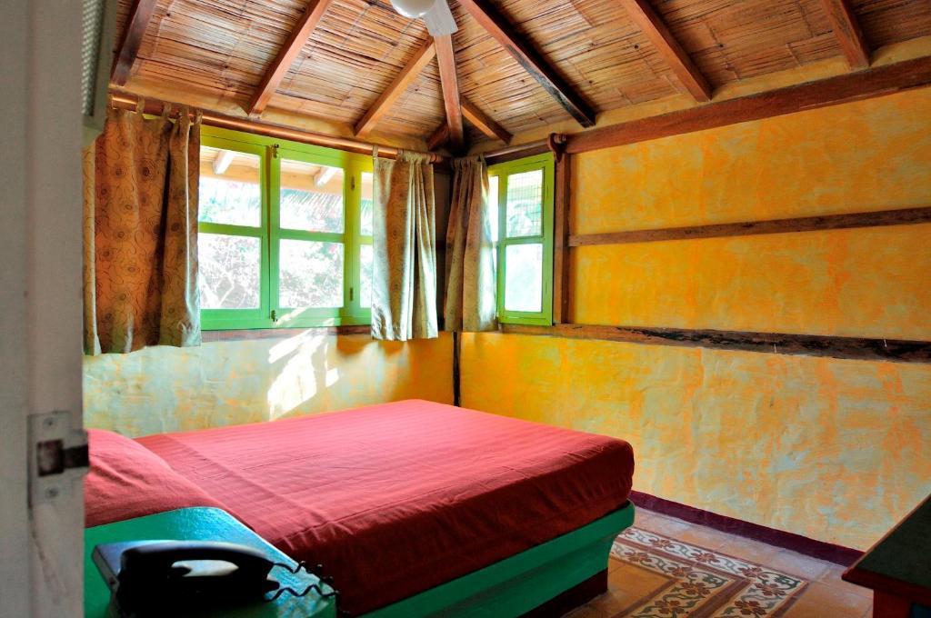 Postel nebo postele na pokoji v ubytování Hosteria Canoa