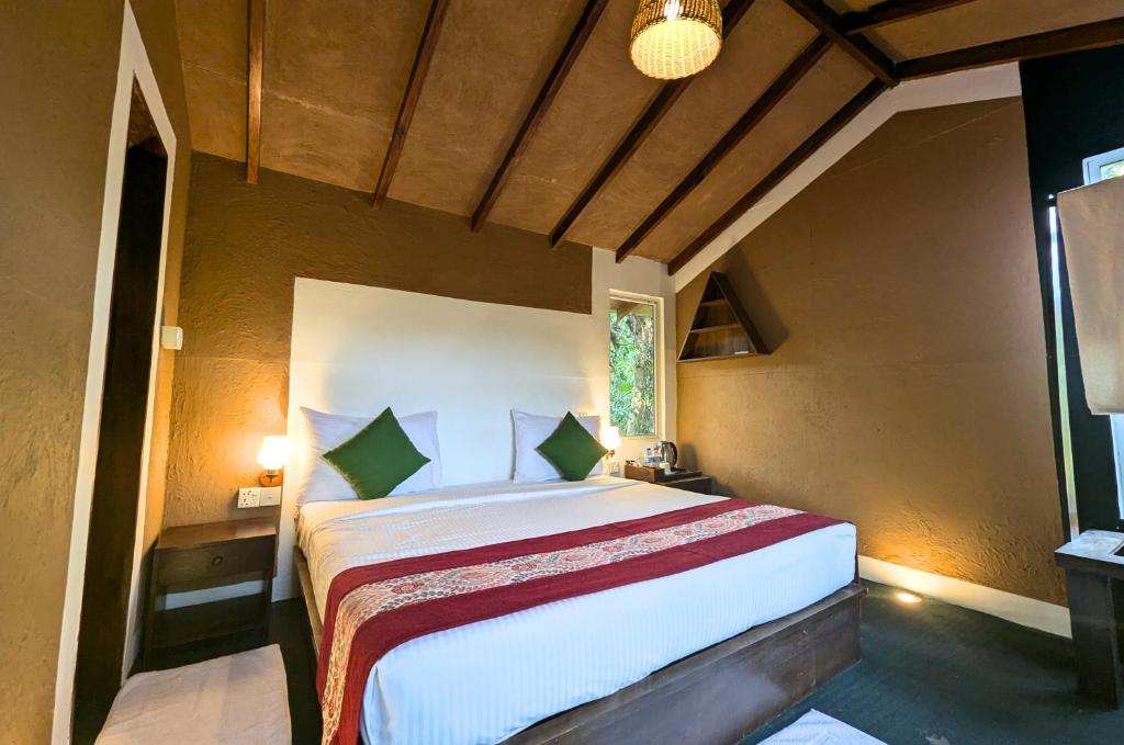 Postel nebo postele na pokoji v ubytování Pinthaliya Resort