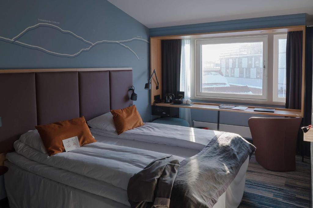 Postel nebo postele na pokoji v ubytování Scandic Ishavshotel
