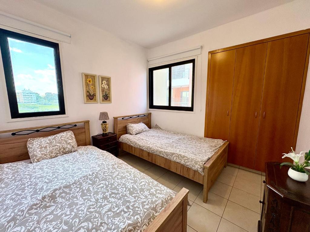 Postel nebo postele na pokoji v ubytování Mackenzie apartment 301