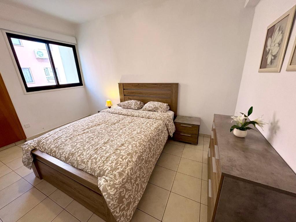 Postel nebo postele na pokoji v ubytování Mackenzie apartment 301