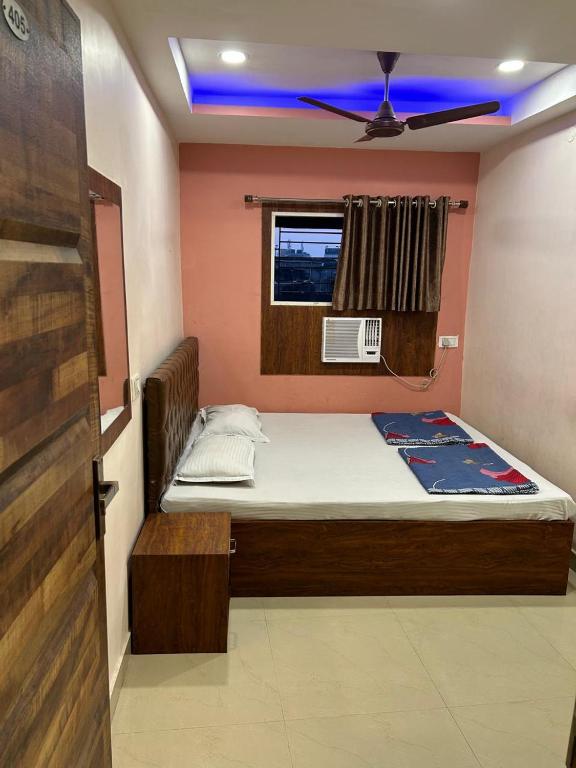 Postel nebo postele na pokoji v ubytování Hotel Globe International