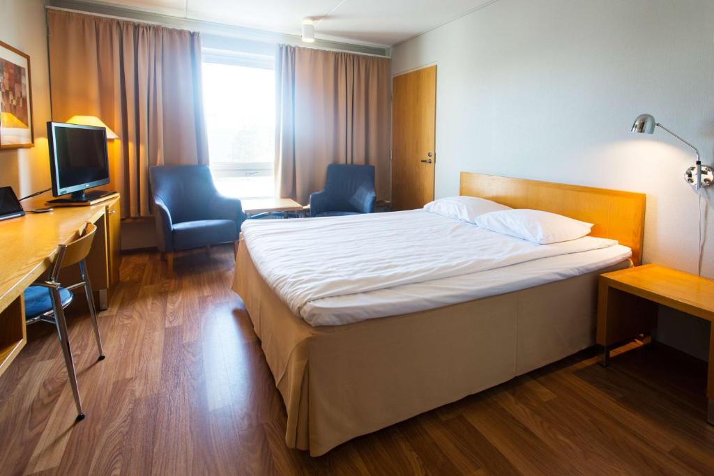Postel nebo postele na pokoji v ubytování Scandic Kemi