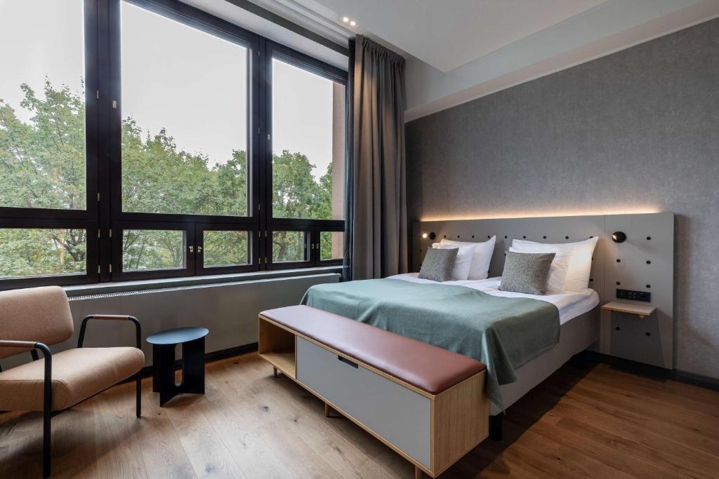 Ένα ή περισσότερα κρεβάτια σε δωμάτιο στο Scandic Helsinki Hub