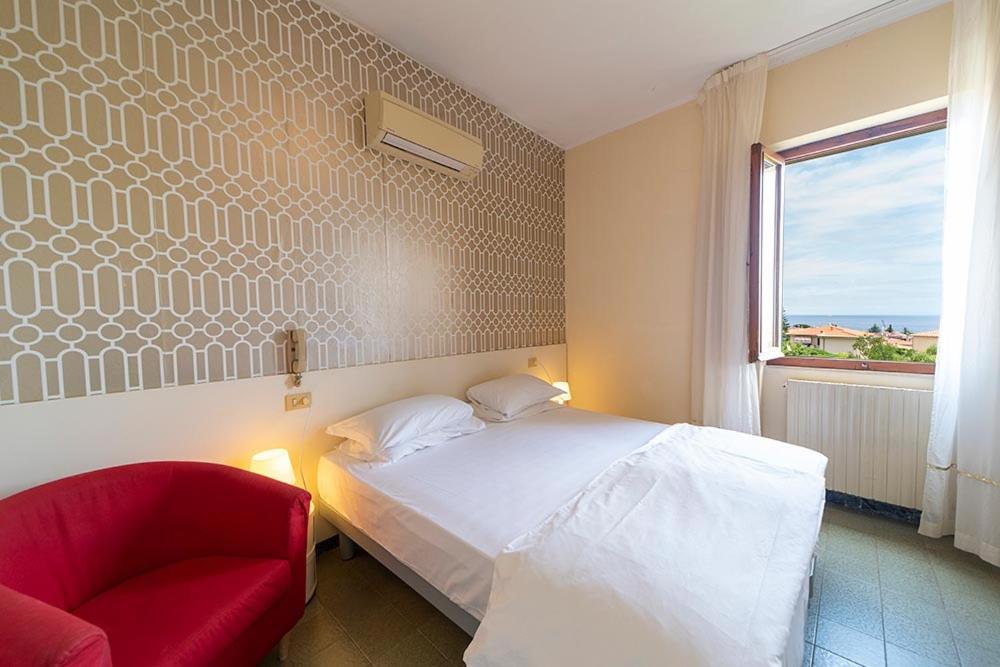 Postel nebo postele na pokoji v ubytování Hotel Casa Lupi