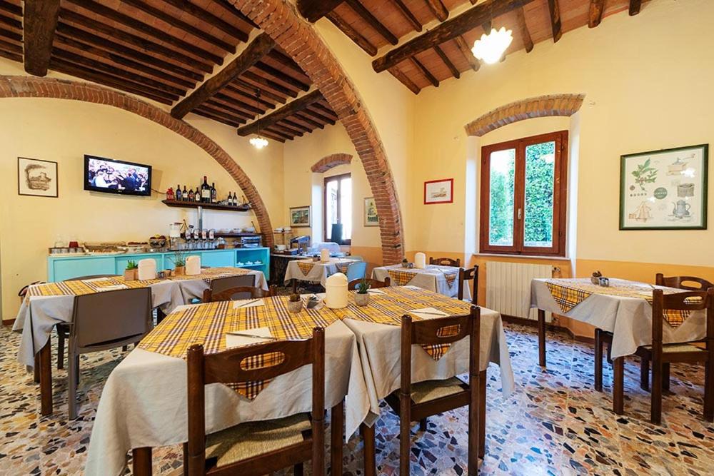 TV a/nebo společenská místnost v ubytování Hotel Casa Lupi