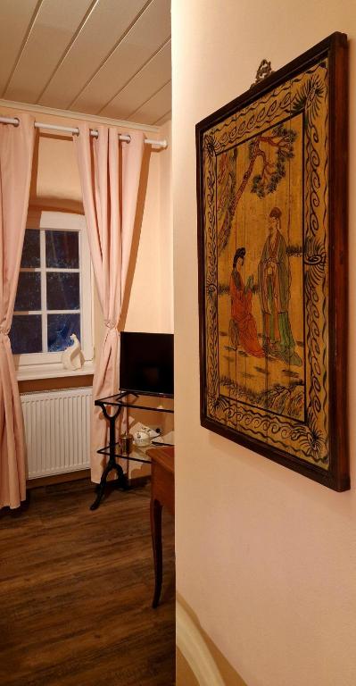 TV a/nebo společenská místnost v ubytování Halbinsel am See