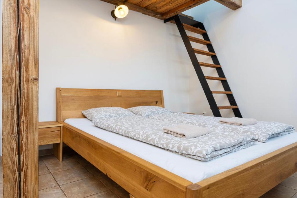 Postel nebo postele na pokoji v ubytování Penzion Mikulecký Kutloch