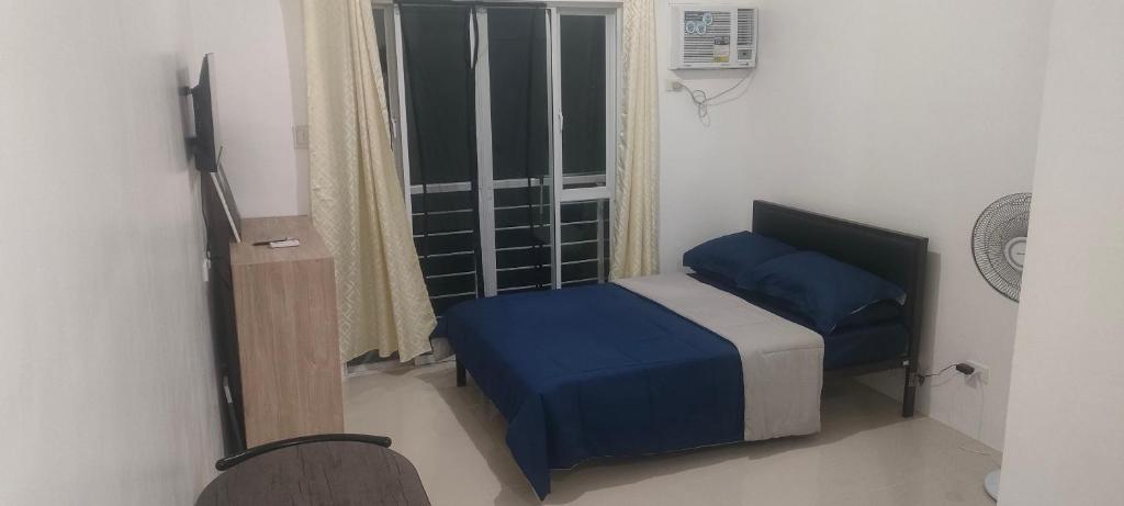 Postel nebo postele na pokoji v ubytování Studio Condo Modena Town Square Minglanilla