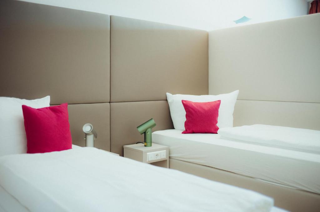 Postel nebo postele na pokoji v ubytování Hotel Calamus - 4 Sterne Superior