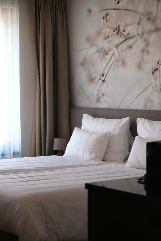 Postel nebo postele na pokoji v ubytování Hotel DAS SAAL