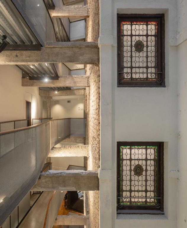 Palanda nebo palandy na pokoji v ubytování Hotel Tayko Bilbao