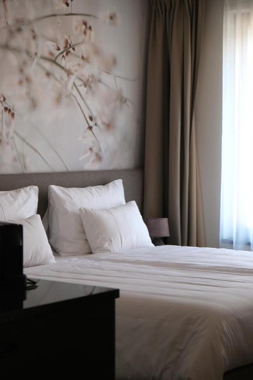 Postel nebo postele na pokoji v ubytování Hotel DAS SAAL