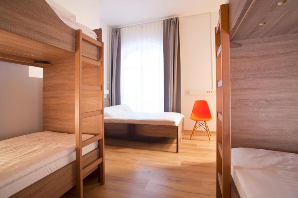 Postel nebo postele na pokoji v ubytování B&B HOTEL Maribor UNI Hostel