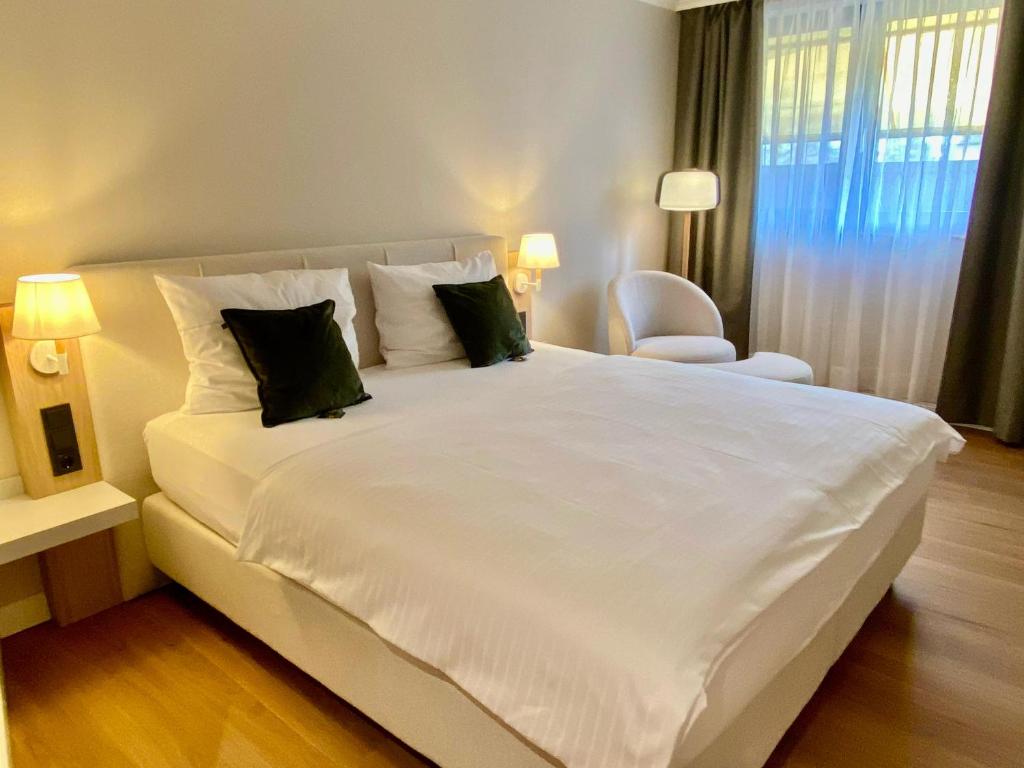 Postel nebo postele na pokoji v ubytování Vital Hotel Westfalen Therme Wellness Resort & SPA