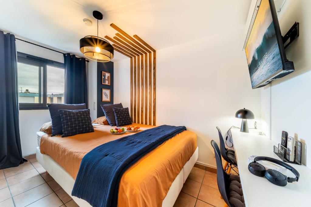 TV a/nebo společenská místnost v ubytování 1 Chambre 9 m2 en colocation avec 15 m2 partagés