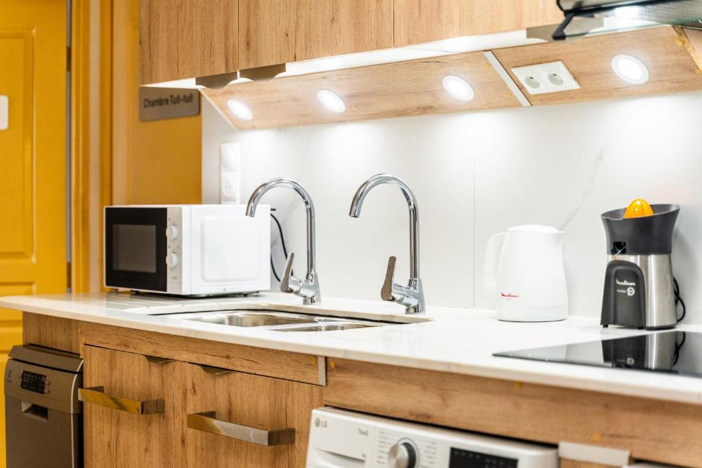 Kuchyň nebo kuchyňský kout v ubytování 1 Chambre 9 m2 en colocation avec 15 m2 partagés
