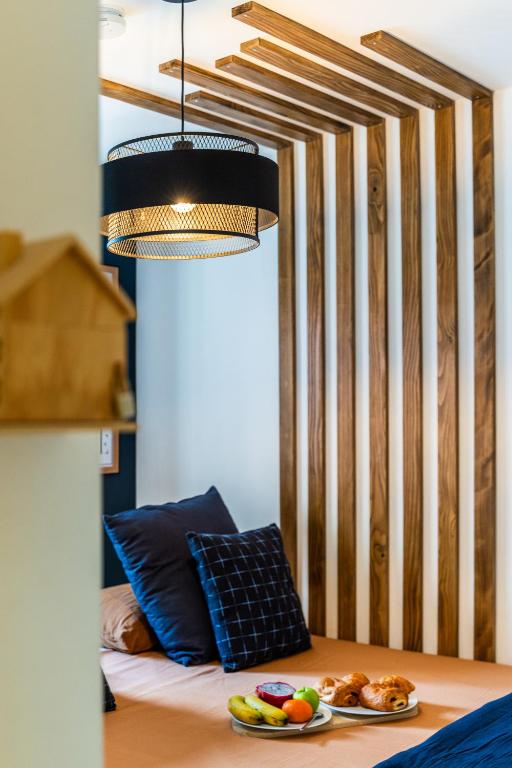 Postel nebo postele na pokoji v ubytování 1 Chambre 9 m2 en colocation avec 15 m2 partagés