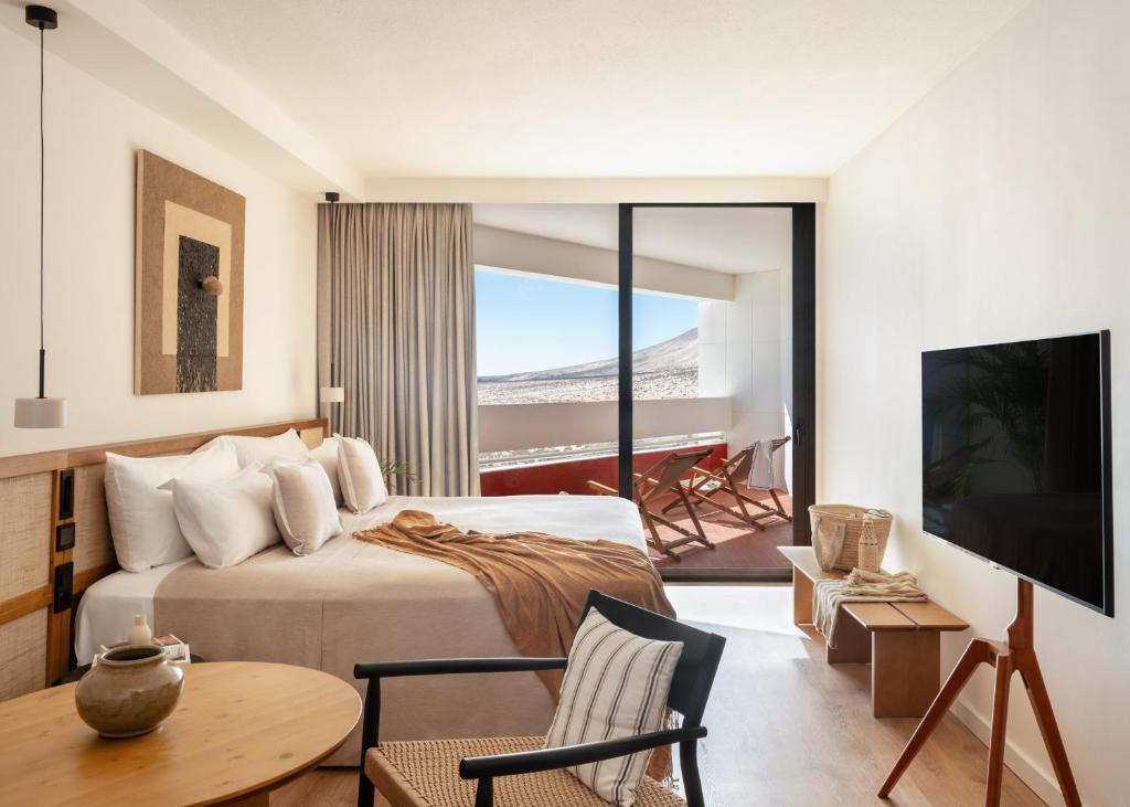 TV a/nebo společenská místnost v ubytování Paradisus by Meliá Fuerteventura - All Inclusive