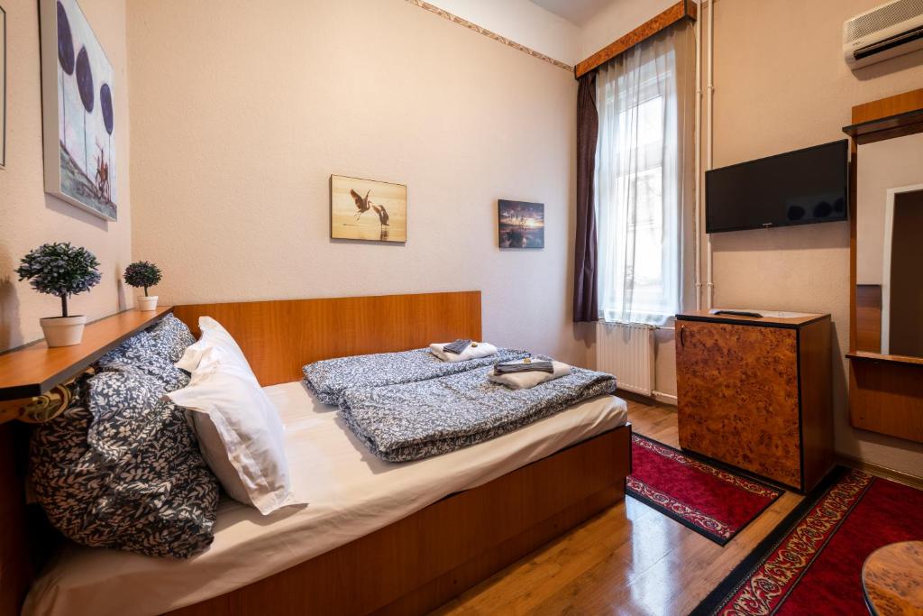 TV a/nebo společenská místnost v ubytování Hotel Kristal Gellért Hill