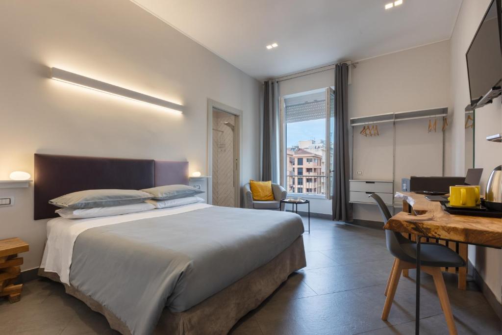 Postel nebo postele na pokoji v ubytování Centro storico via Sassari Accommodation