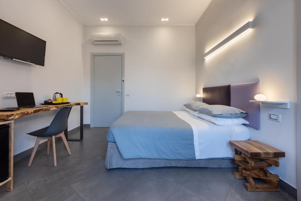 Postel nebo postele na pokoji v ubytování Centro storico via Sassari Accommodation