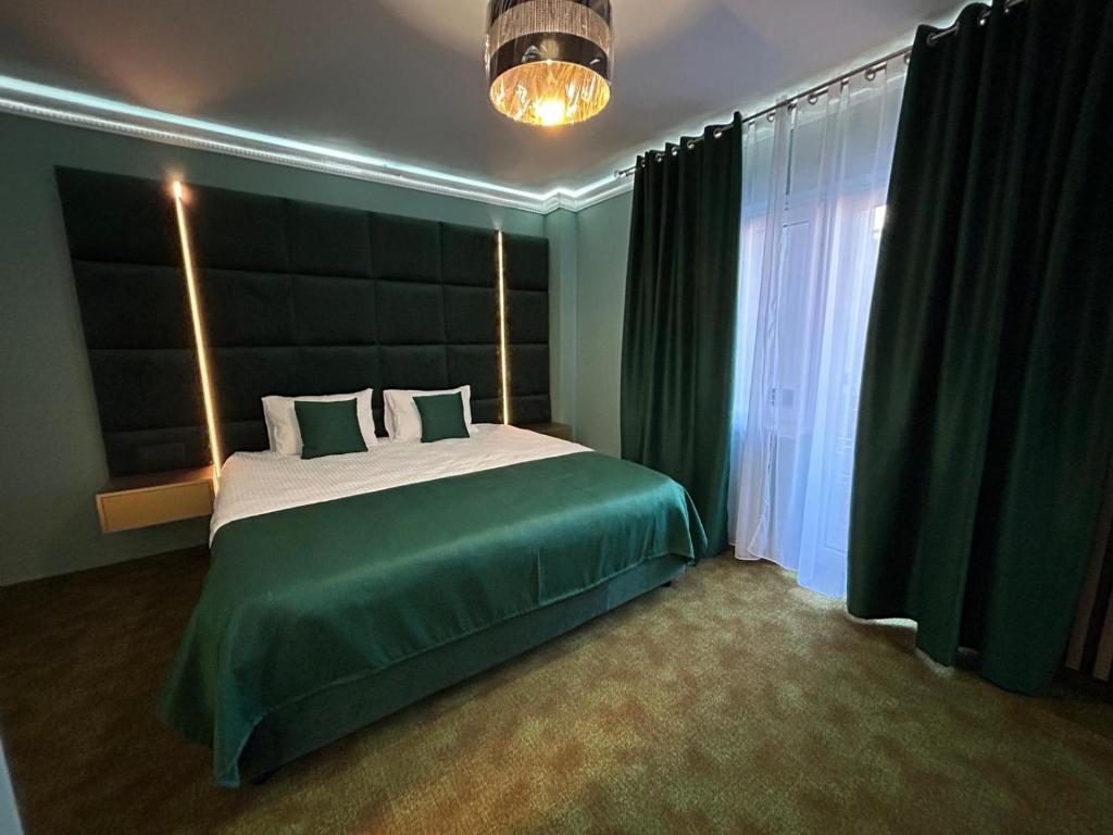 Postel nebo postele na pokoji v ubytování Fit Residence