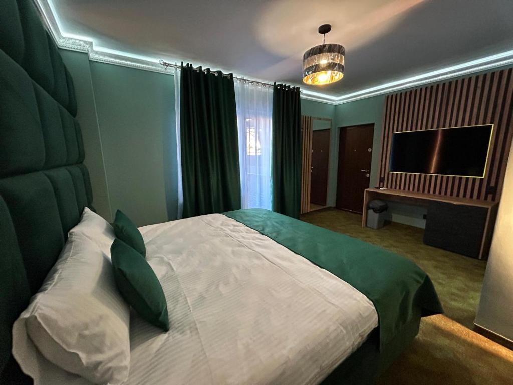 Postel nebo postele na pokoji v ubytování Fit Residence