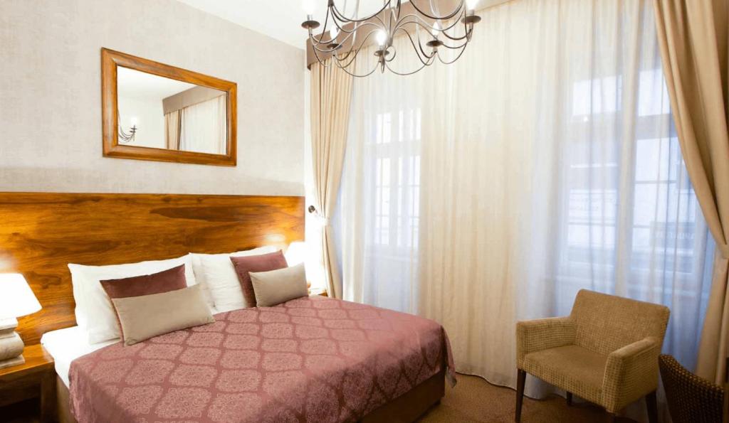 Postel nebo postele na pokoji v ubytování Hotel Residence Agnes