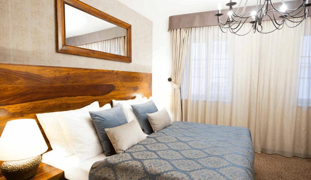 Postel nebo postele na pokoji v ubytování Hotel Residence Agnes