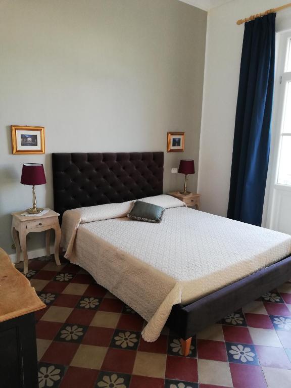 Postel nebo postele na pokoji v ubytování Residenza Ponente