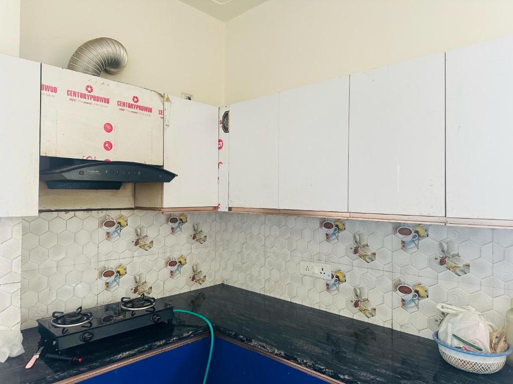 Kuchyň nebo kuchyňský kout v ubytování BSR Properties