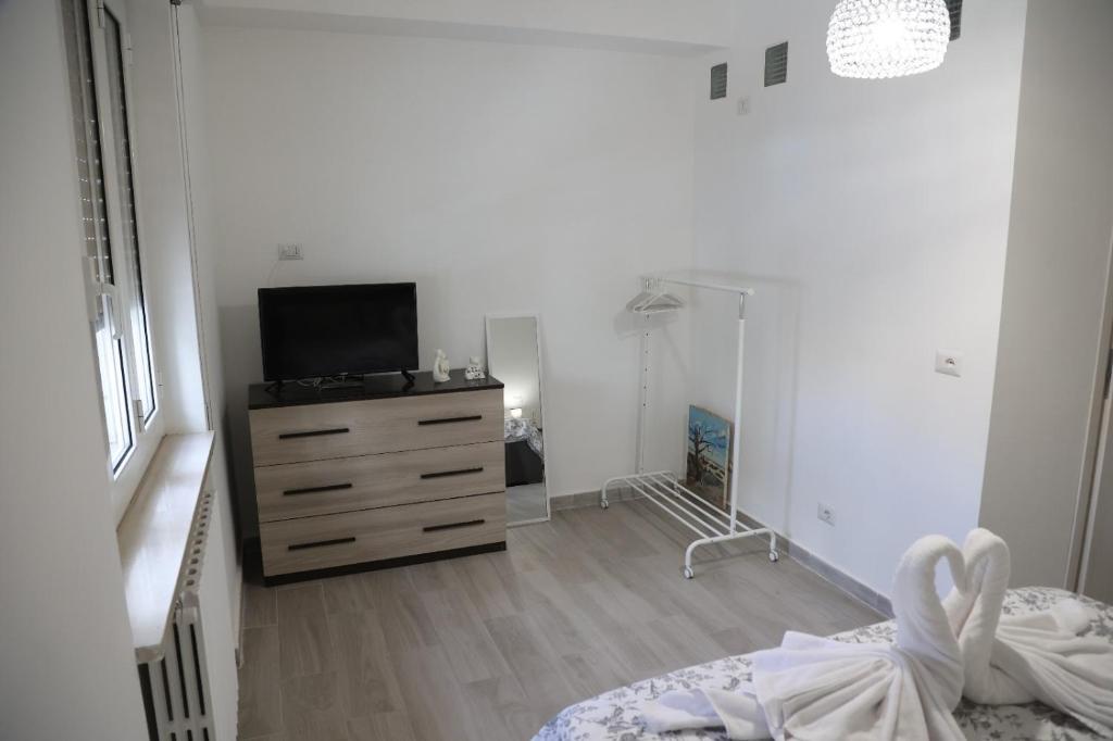 TV a/nebo společenská místnost v ubytování Sognare in Puglia